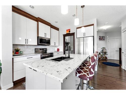 21 Redstone Road Ne, Calgary, AB - Indoor Photo Showing Kitchen With Double Sink With Upgraded Kitchen