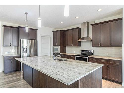 331 Legacy Heights Se, Calgary, AB - Indoor Photo Showing Kitchen With Stainless Steel Kitchen With Double Sink With Upgraded Kitchen