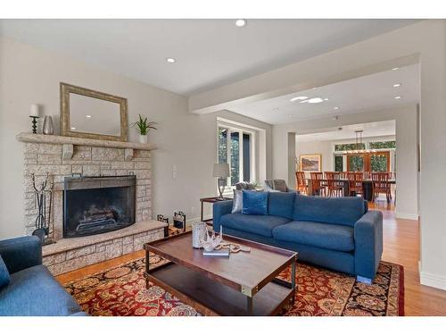 27 Alexa Close, Rural Rocky View County, AB - Indoor Photo Showing Living Room With Fireplace