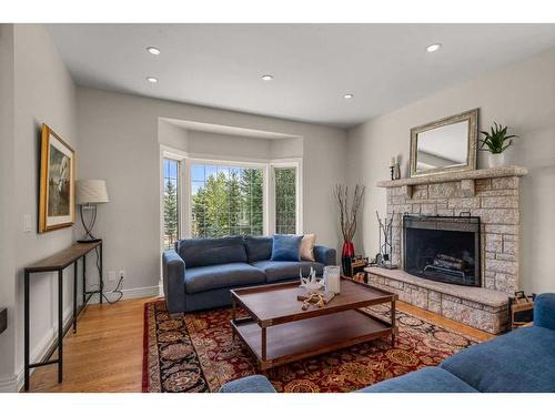 27 Alexa Close, Rural Rocky View County, AB - Indoor Photo Showing Living Room With Fireplace