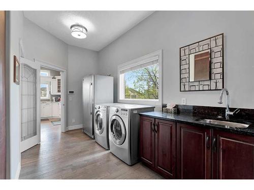 31 Braemar Glen Road, Rural Rocky View County, AB - Indoor Photo Showing Laundry Room