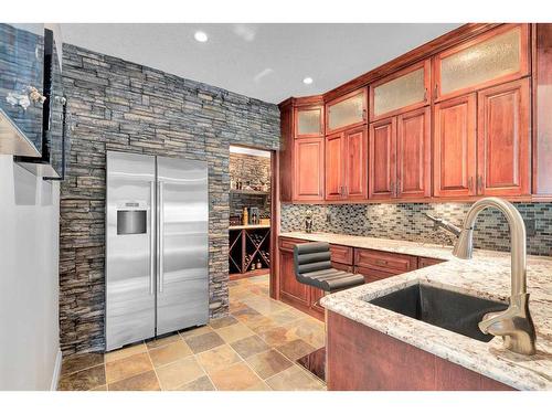 31 Braemar Glen Road, Rural Rocky View County, AB - Indoor Photo Showing Kitchen With Double Sink