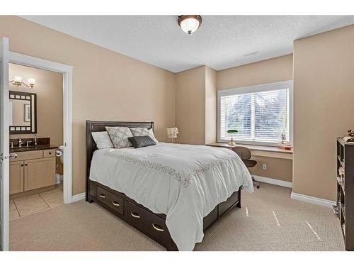 31 Braemar Glen Road, Rural Rocky View County, AB - Indoor Photo Showing Bedroom