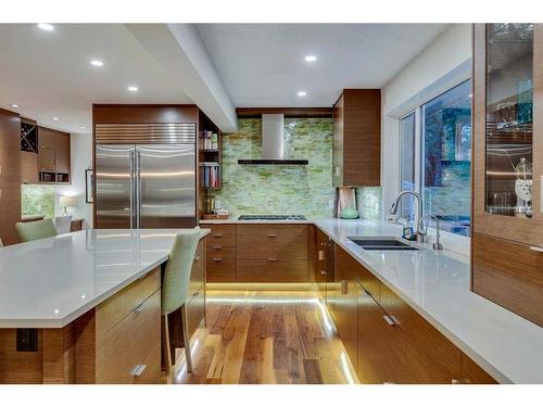 100 Mapleburn Drive Se, Calgary, AB - Indoor Photo Showing Kitchen With Double Sink With Upgraded Kitchen