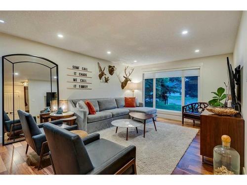 100 Mapleburn Drive Se, Calgary, AB - Indoor Photo Showing Living Room