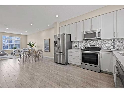 28 Copperpond Rise Se, Calgary, AB - Indoor Photo Showing Kitchen With Stainless Steel Kitchen With Upgraded Kitchen