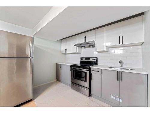 147 Rudlecairn Road Ne, Calgary, AB - Indoor Photo Showing Kitchen