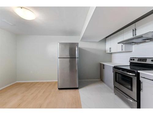 147 Rudlecairn Road Ne, Calgary, AB - Indoor Photo Showing Kitchen