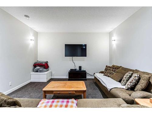 220 Stonemere Close, Chestermere, AB - Indoor Photo Showing Living Room