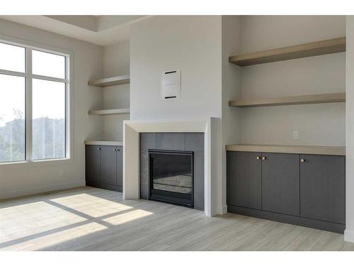 2 Rock Lake Heights Nw, Calgary, AB - Indoor With Fireplace