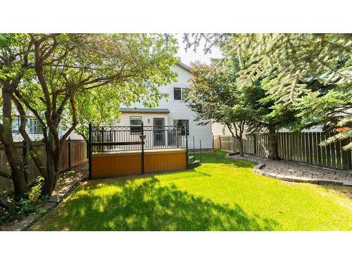 863 Tuscany Drive Nw, Calgary, AB - Outdoor With Deck Patio Veranda With Backyard