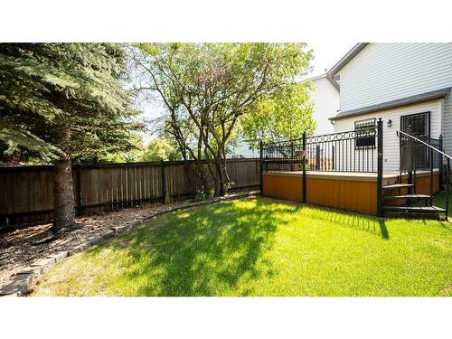 863 Tuscany Drive Nw, Calgary, AB - Outdoor With Deck Patio Veranda With Backyard