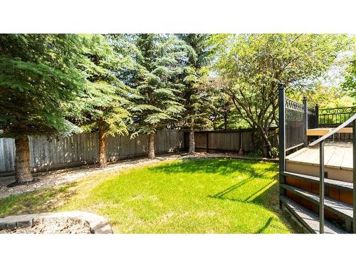 863 Tuscany Drive Nw, Calgary, AB - Outdoor With Backyard