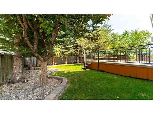 863 Tuscany Drive Nw, Calgary, AB - Outdoor With Deck Patio Veranda With Backyard