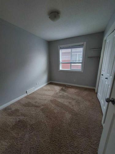 233 Evansdale Way Nw, Calgary, AB - Indoor Photo Showing Other Room