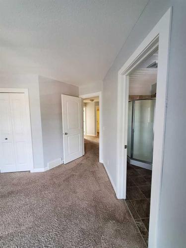 233 Evansdale Way Nw, Calgary, AB - Indoor Photo Showing Other Room