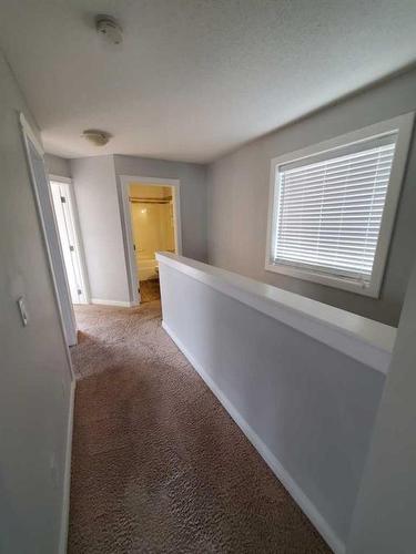 233 Evansdale Way Nw, Calgary, AB - Indoor Photo Showing Other Room