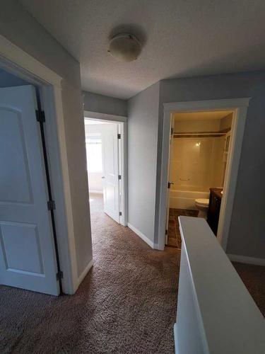 233 Evansdale Way Nw, Calgary, AB - Indoor Photo Showing Other Room