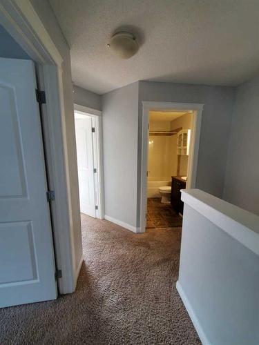 233 Evansdale Way Nw, Calgary, AB - Indoor Photo Showing Other Room