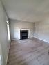 233 Evansdale Way Nw, Calgary, AB  - Indoor Photo Showing Living Room With Fireplace 