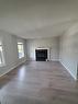 233 Evansdale Way Nw, Calgary, AB  - Indoor Photo Showing Living Room With Fireplace 