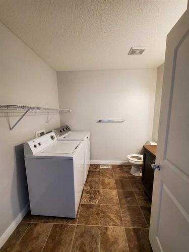 233 Evansdale Way Nw, Calgary, AB - Indoor Photo Showing Laundry Room