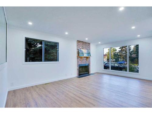 52 Falbury Bay Ne, Calgary, AB - Indoor Photo Showing Living Room With Fireplace