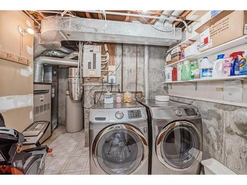 7-10401 19 Street Sw, Calgary, AB - Indoor Photo Showing Laundry Room