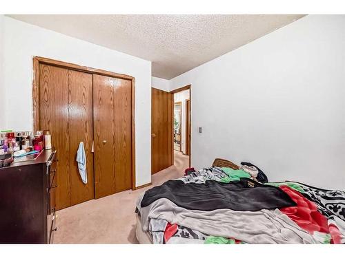 24 Carmel Place Ne, Calgary, AB - Indoor Photo Showing Bedroom