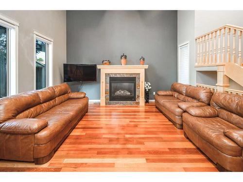 2312 5 Avenue Nw, Calgary, AB - Indoor Photo Showing Living Room With Fireplace