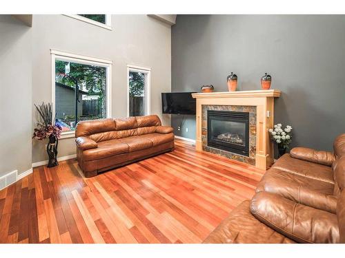 2312 5 Avenue Nw, Calgary, AB - Indoor Photo Showing Living Room With Fireplace