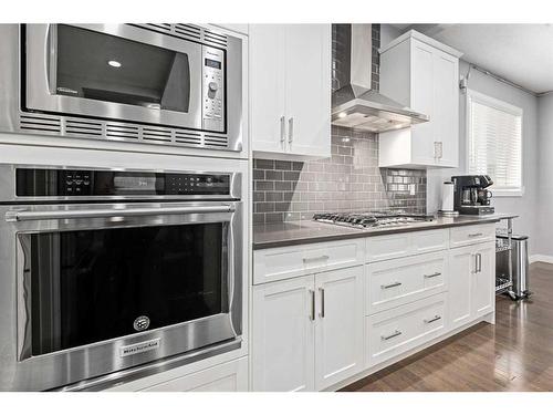 44 Rainbow Falls Boulevard, Chestermere, AB - Indoor Photo Showing Kitchen With Upgraded Kitchen