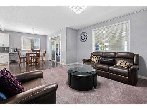 44 Rainbow Falls Boulevard, Chestermere, AB - Indoor Photo Showing Living Room