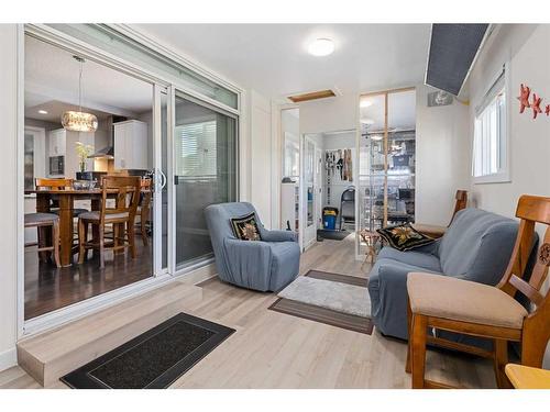 44 Rainbow Falls Boulevard, Chestermere, AB - Indoor Photo Showing Living Room