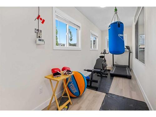 44 Rainbow Falls Boulevard, Chestermere, AB - Indoor Photo Showing Gym Room