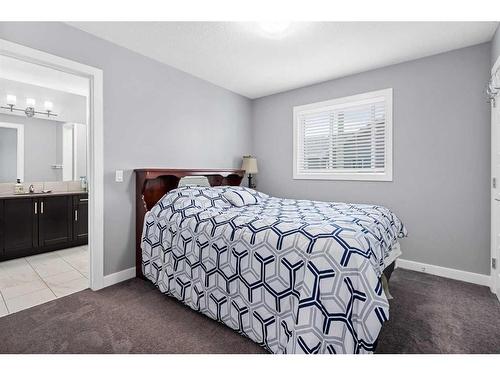 44 Rainbow Falls Boulevard, Chestermere, AB - Indoor Photo Showing Bedroom