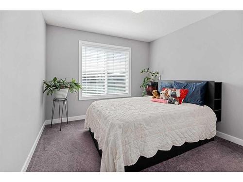 44 Rainbow Falls Boulevard, Chestermere, AB - Indoor Photo Showing Bedroom