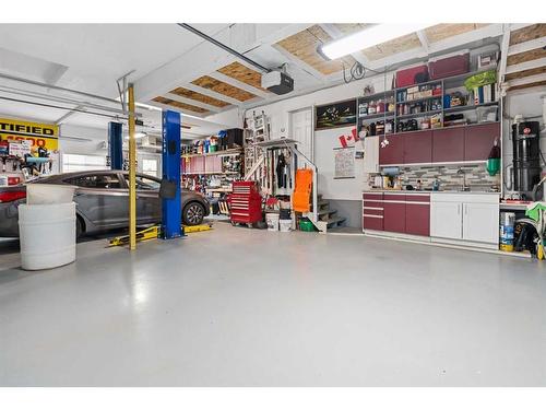 44 Rainbow Falls Boulevard, Chestermere, AB - Indoor Photo Showing Garage