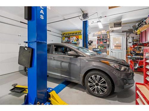 44 Rainbow Falls Boulevard, Chestermere, AB - Indoor Photo Showing Garage