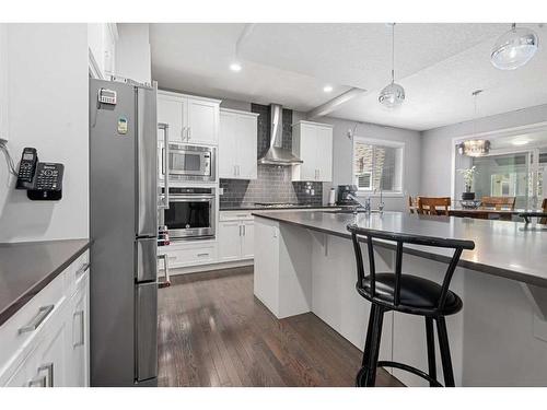 44 Rainbow Falls Boulevard, Chestermere, AB - Indoor Photo Showing Kitchen With Upgraded Kitchen