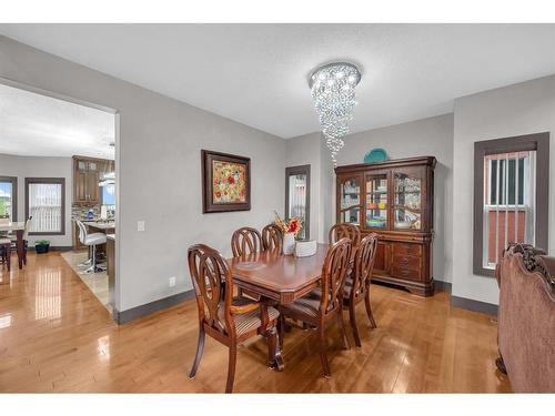 348 Kinniburgh Boulevard, Chestermere, AB - Indoor Photo Showing Dining Room