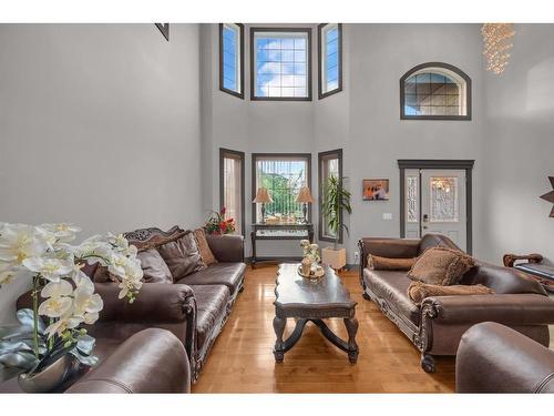 348 Kinniburgh Boulevard, Chestermere, AB - Indoor Photo Showing Living Room