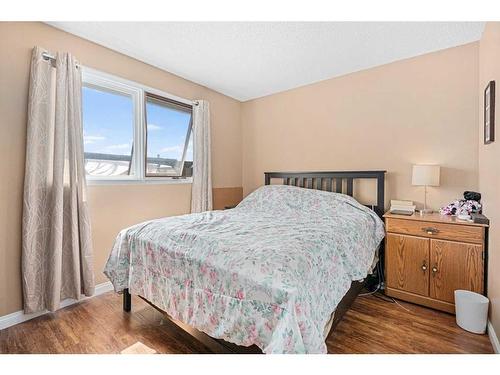 227 Queensland Place Se, Calgary, AB - Indoor Photo Showing Bedroom