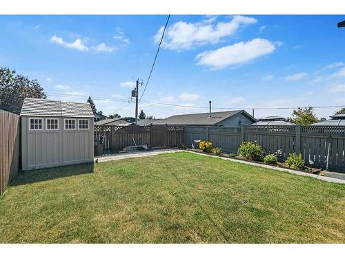 227 Queensland Place Se, Calgary, AB - Outdoor With Backyard