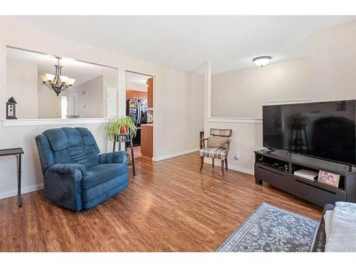 227 Queensland Place Se, Calgary, AB - Indoor Photo Showing Living Room