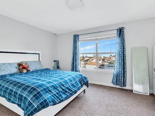 8 Castlebury Way Ne, Calgary, AB - Indoor Photo Showing Bedroom