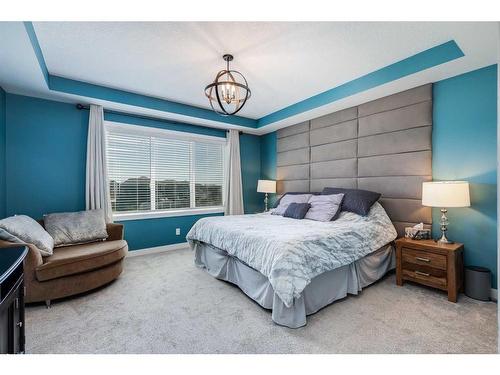 203 Cranbrook Circle Se, Calgary, AB - Indoor Photo Showing Bedroom