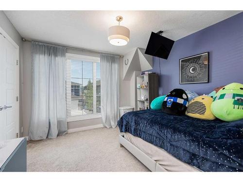 203 Cranbrook Circle Se, Calgary, AB - Indoor Photo Showing Bedroom