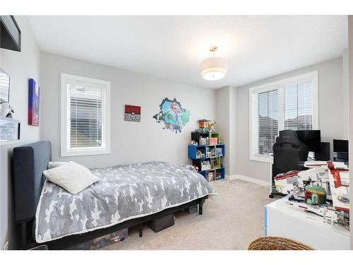 203 Cranbrook Circle Se, Calgary, AB - Indoor Photo Showing Bedroom