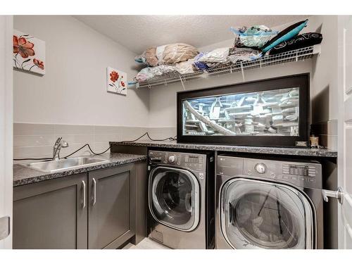 203 Cranbrook Circle Se, Calgary, AB - Indoor Photo Showing Laundry Room